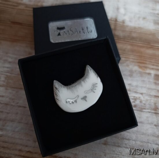 White cat brooch with silver accents